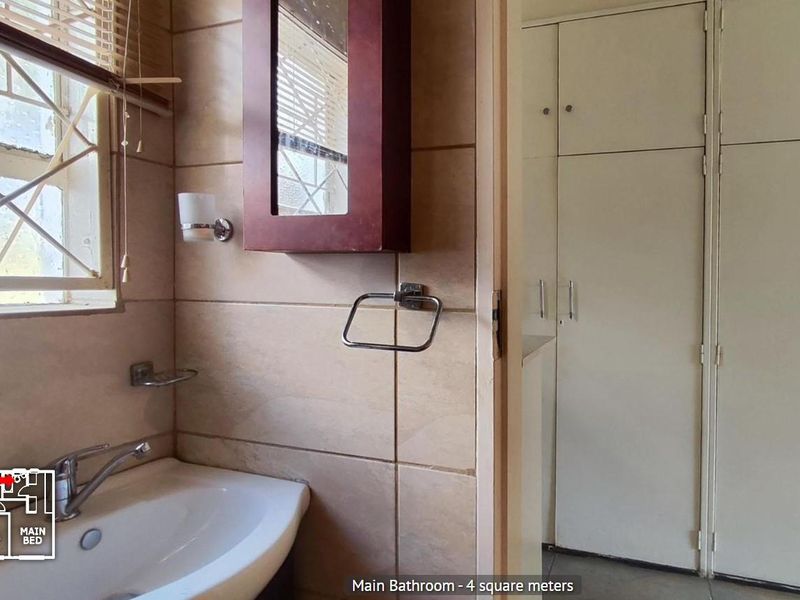 Spacious 4-Bedroom Home with Huge Potential in Nigel - Photo 9