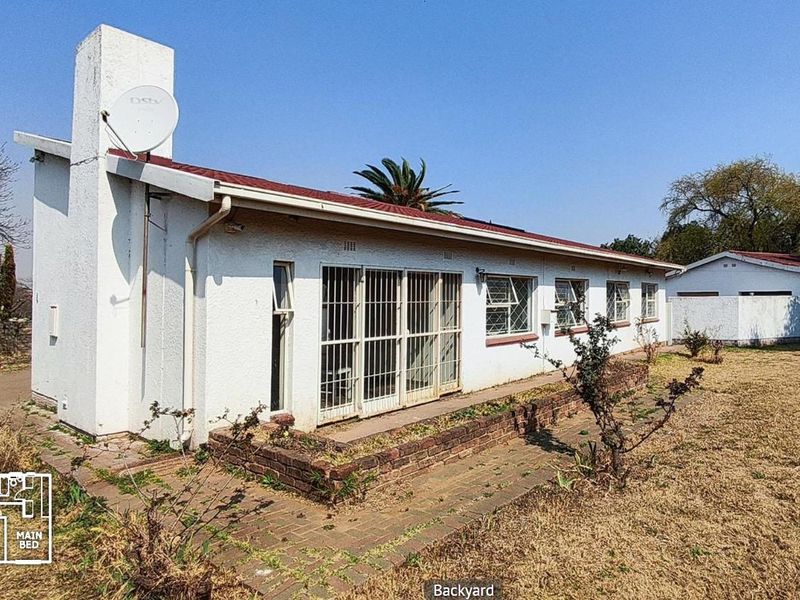 Spacious 4-Bedroom Home with Huge Potential in Nigel - Photo 6