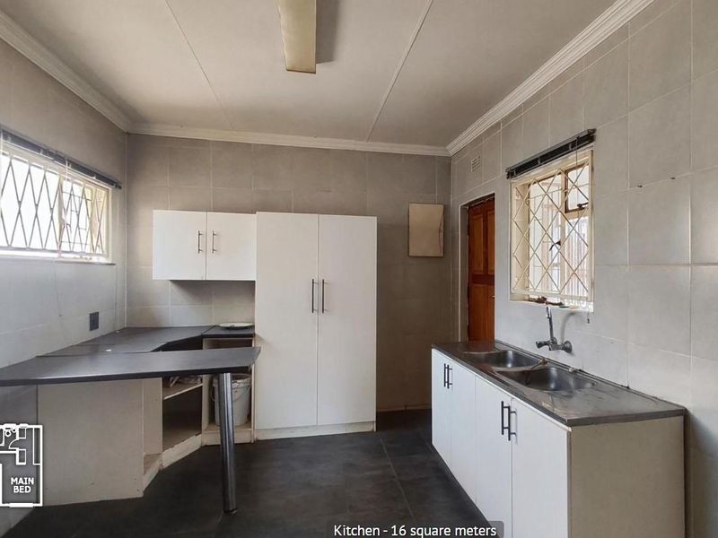 Spacious 4-Bedroom Home with Huge Potential in Nigel - Photo 3