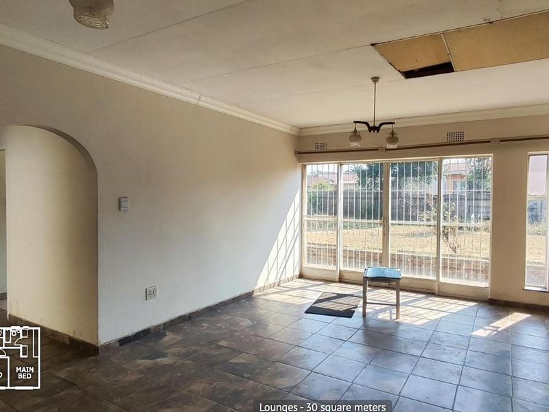 Spacious 4-Bedroom Home with Huge Potential in Nigel - Photo 5