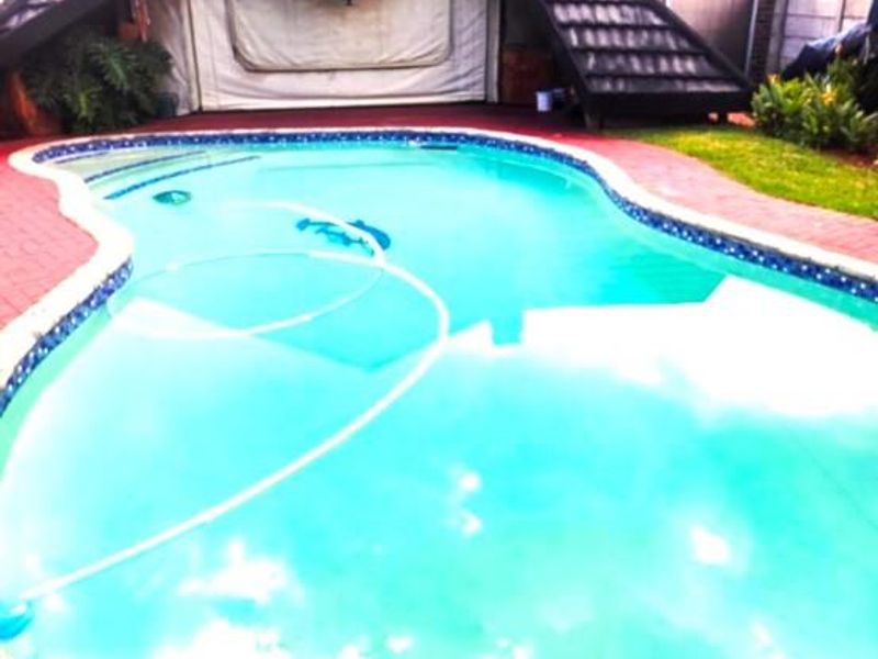 Big family home low maintenance garden with pool and entertainment area in Rhodesdene - Photo 5