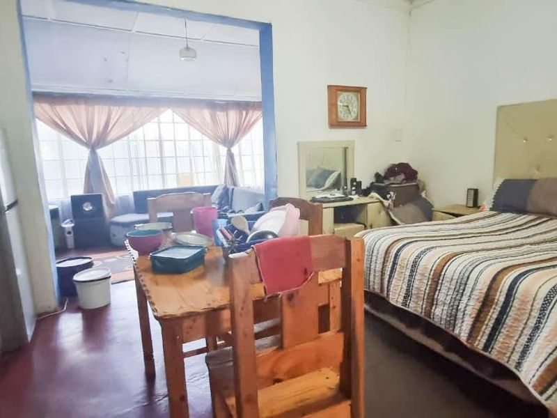 Income-Generating 4-Bedroom Home with Cottage in Modder East - Photo 6