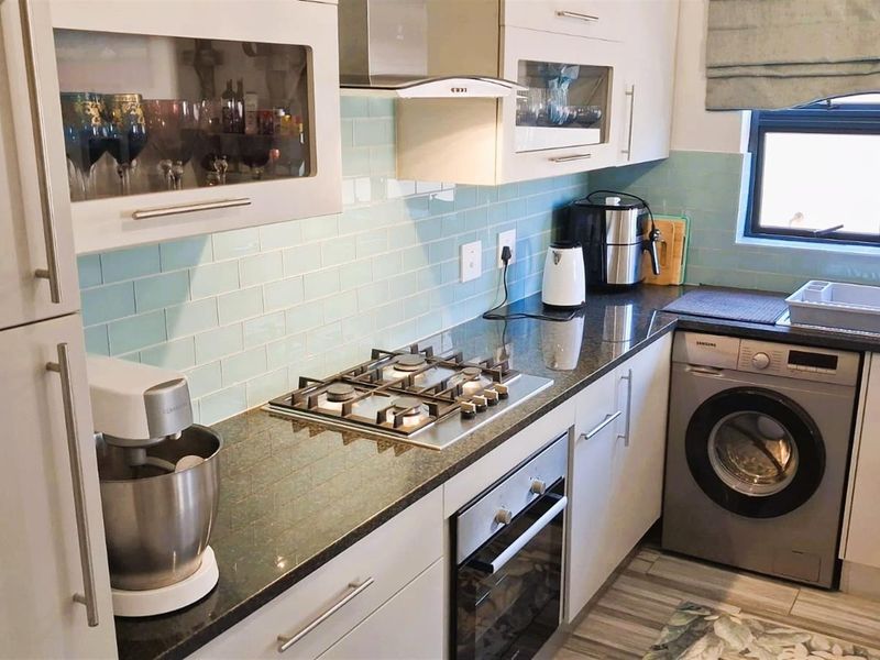 Modern 3-Bedroom Home with Indoor Braai plus Canal Access | Move-In Ready in Marina Martinique - Photo 8