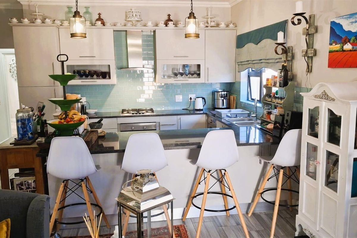 Modern 3-Bedroom Home with Indoor Braai plus Canal Access | Move-In Ready in Marina Martinique - Photo 3