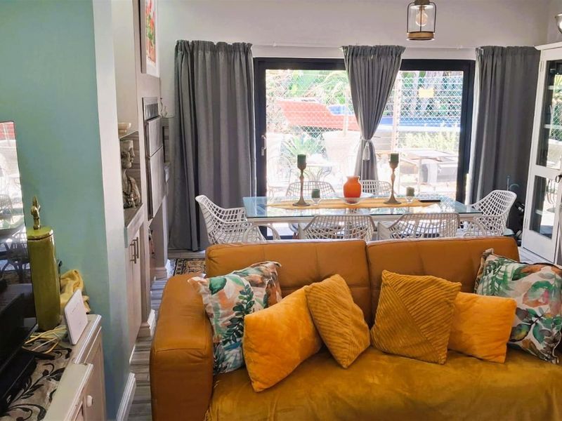 Modern 3-Bedroom Home with Indoor Braai plus Canal Access | Move-In Ready in Marina Martinique - Photo 4