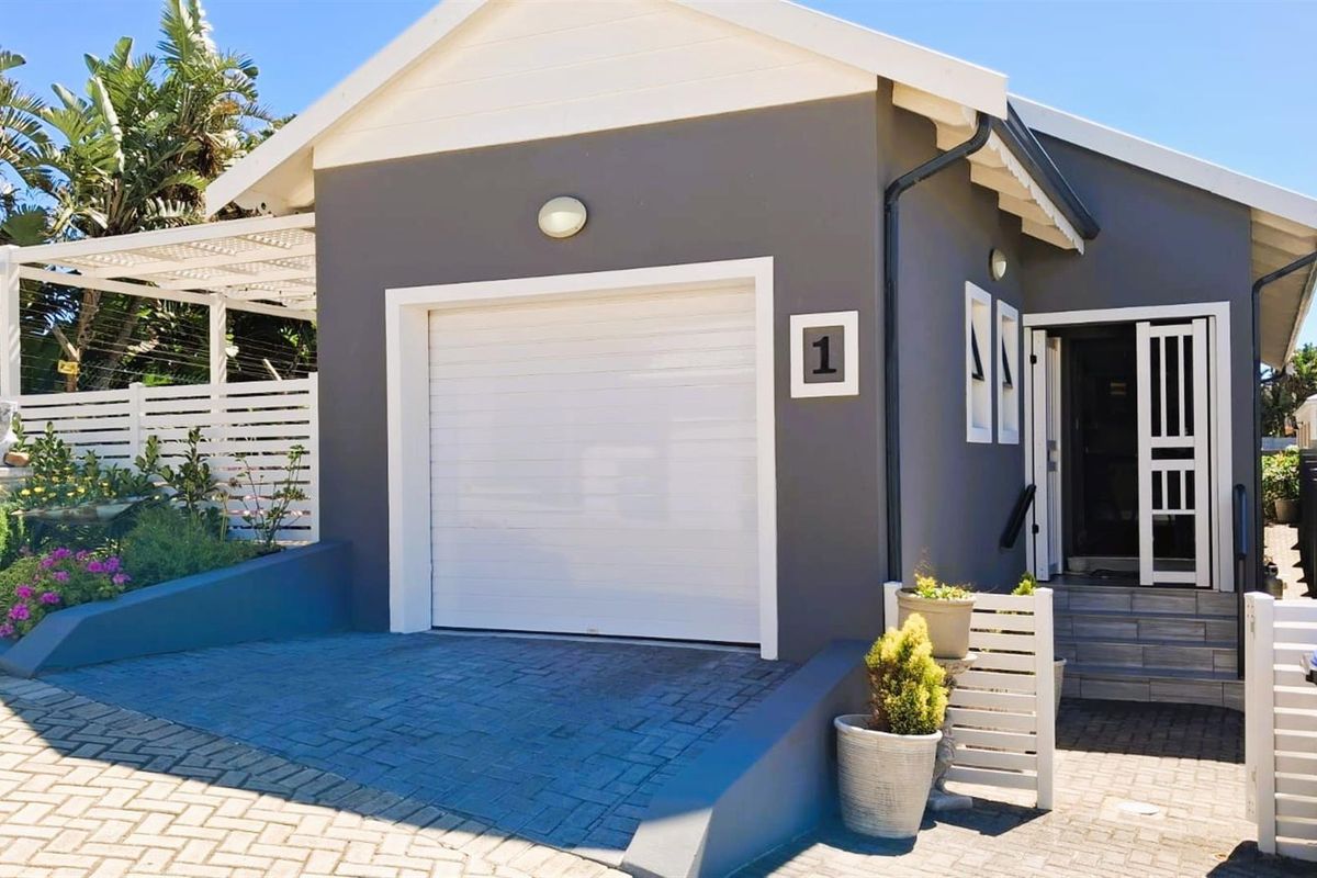Modern 3-Bedroom Home with Indoor Braai plus Canal Access | Move-In Ready in Marina Martinique - Photo 2