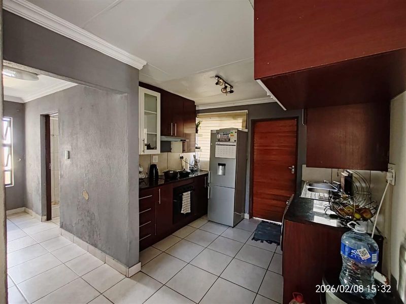 Stylish Double-Storey Home with Rooftop Entertainment - Photo 3