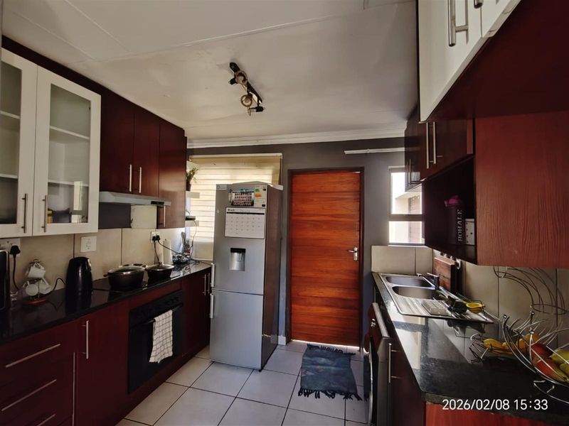 Stylish Double-Storey Home with Rooftop Entertainment - Photo 2