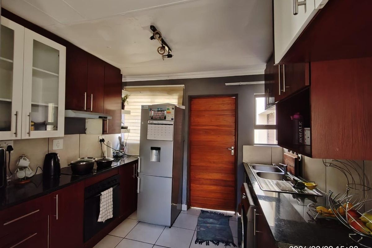 Stylish Double-Storey Home with Rooftop Entertainment - Photo 2