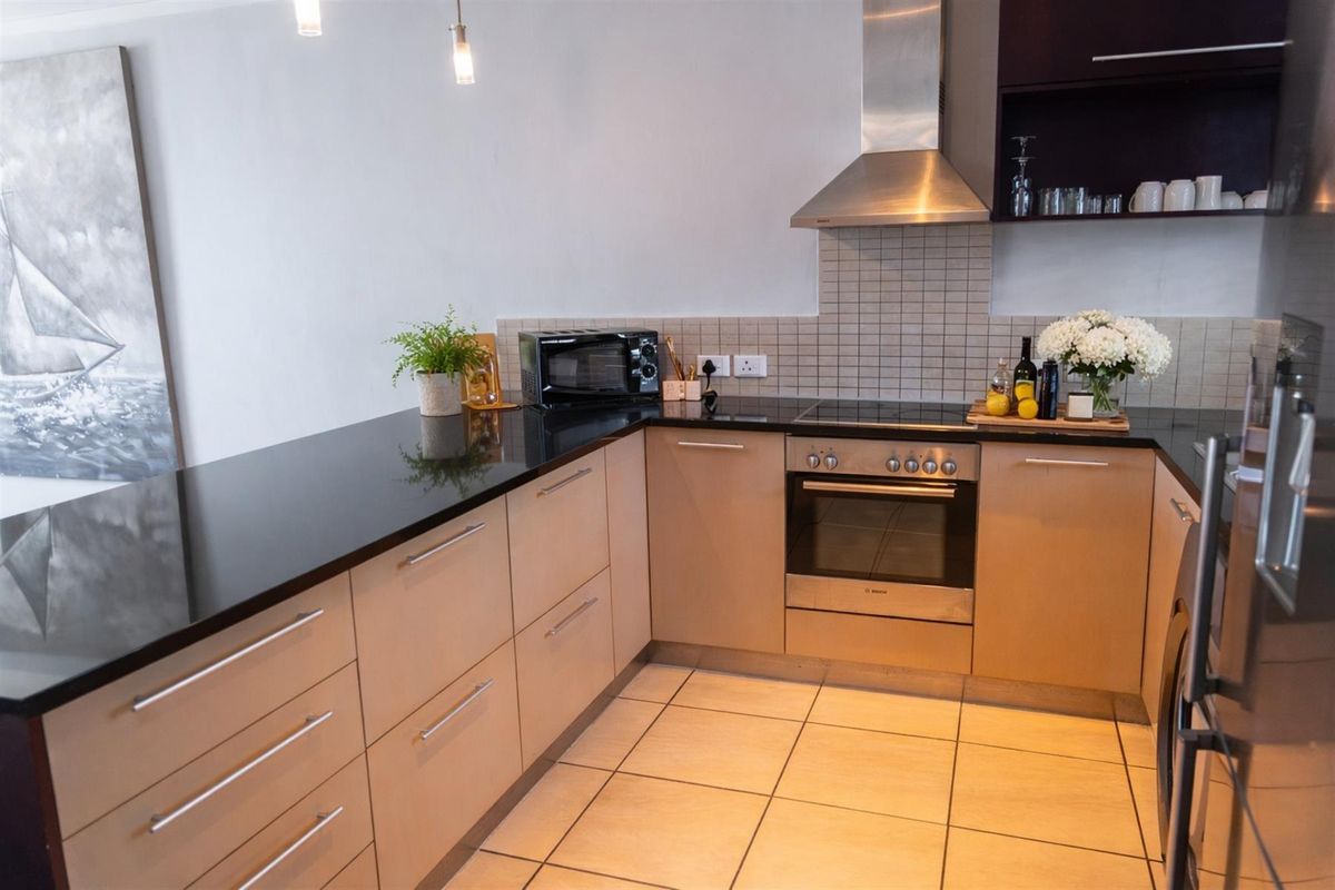 Airbnb Approved ICON Building Apartment | Walk to CTICC | Fully Furnished Investment | Foreshore - Photo 5