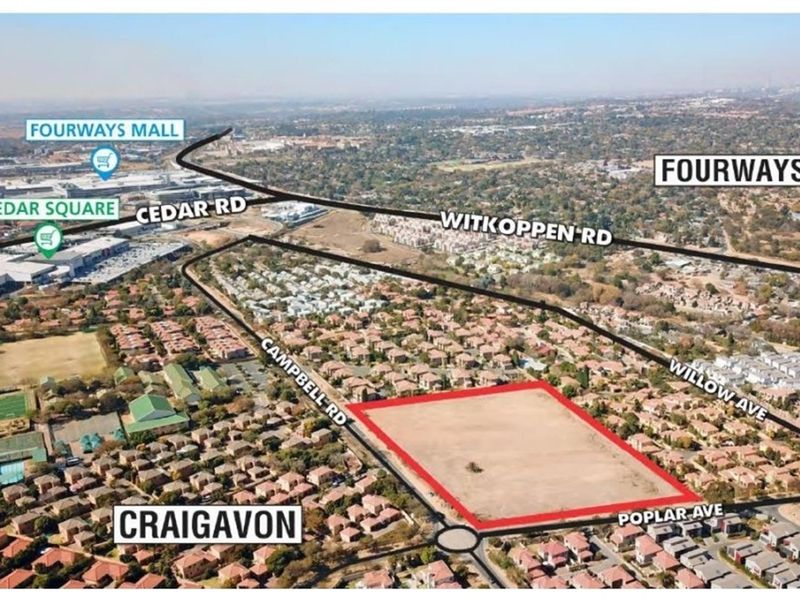 Aerial view of a vacant residential land parcel in Craigavon, highlighting its location relative to major roads and nearby shopping centers.