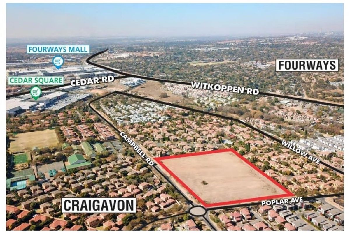 Aerial view of a vacant residential land parcel in Craigavon, highlighting its location relative to major roads and nearby shopping centers.