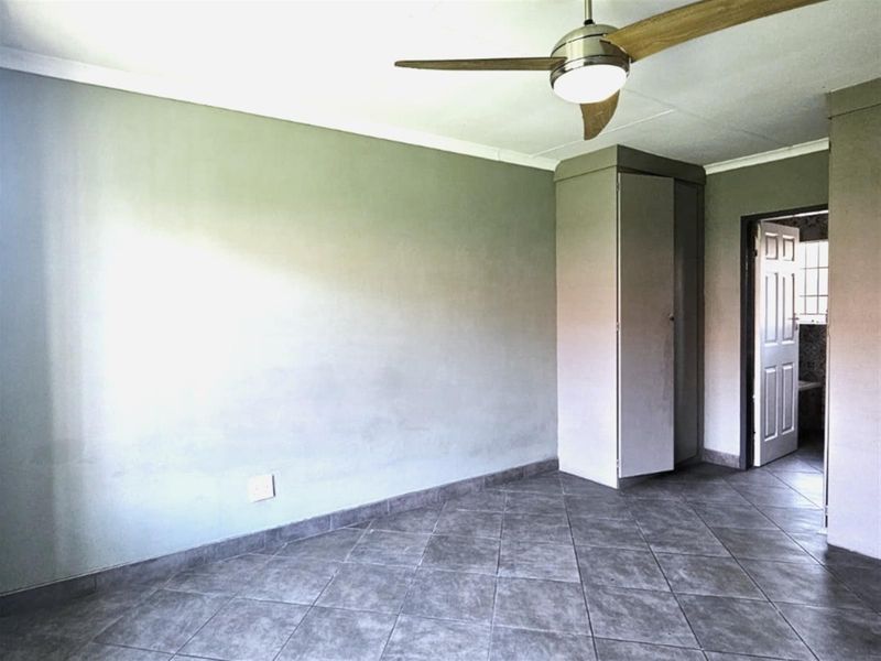 For sale R1 445 000.  An amazing 2 bedroom, 2 bathroom, double garage, patio with build in braai - Photo 9