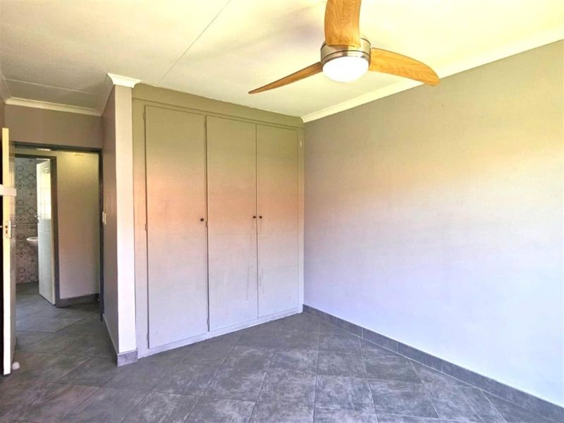 For sale R1 445 000.  An amazing 2 bedroom, 2 bathroom, double garage, patio with build in braai - Photo 7