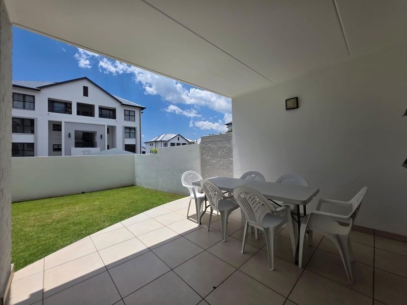 Modern Three-Bedroom Home in Secure Lifestyle Estate with Exceptional Amenities - Photo 9