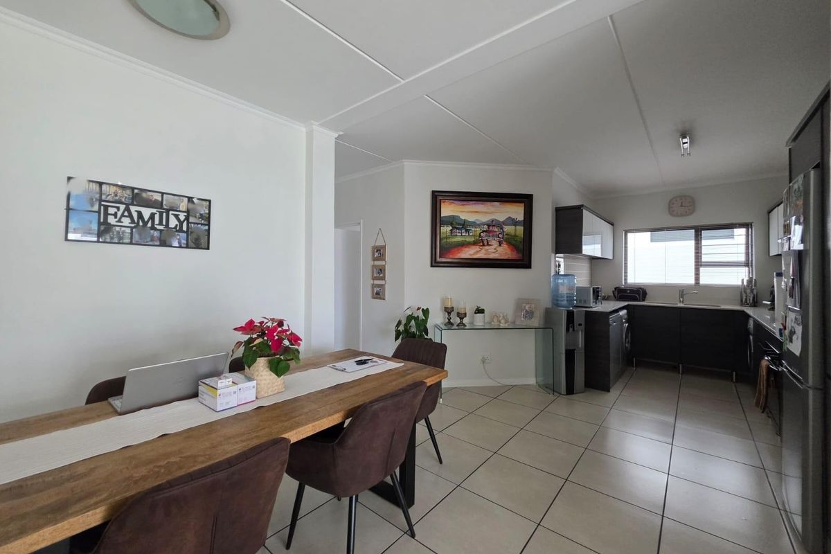 Modern Three-Bedroom Home in Secure Lifestyle Estate with Exceptional Amenities - Photo 3