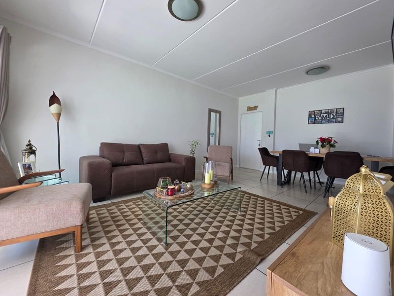 Modern Three-Bedroom Home in Secure Lifestyle Estate with Exceptional Amenities - Photo 2