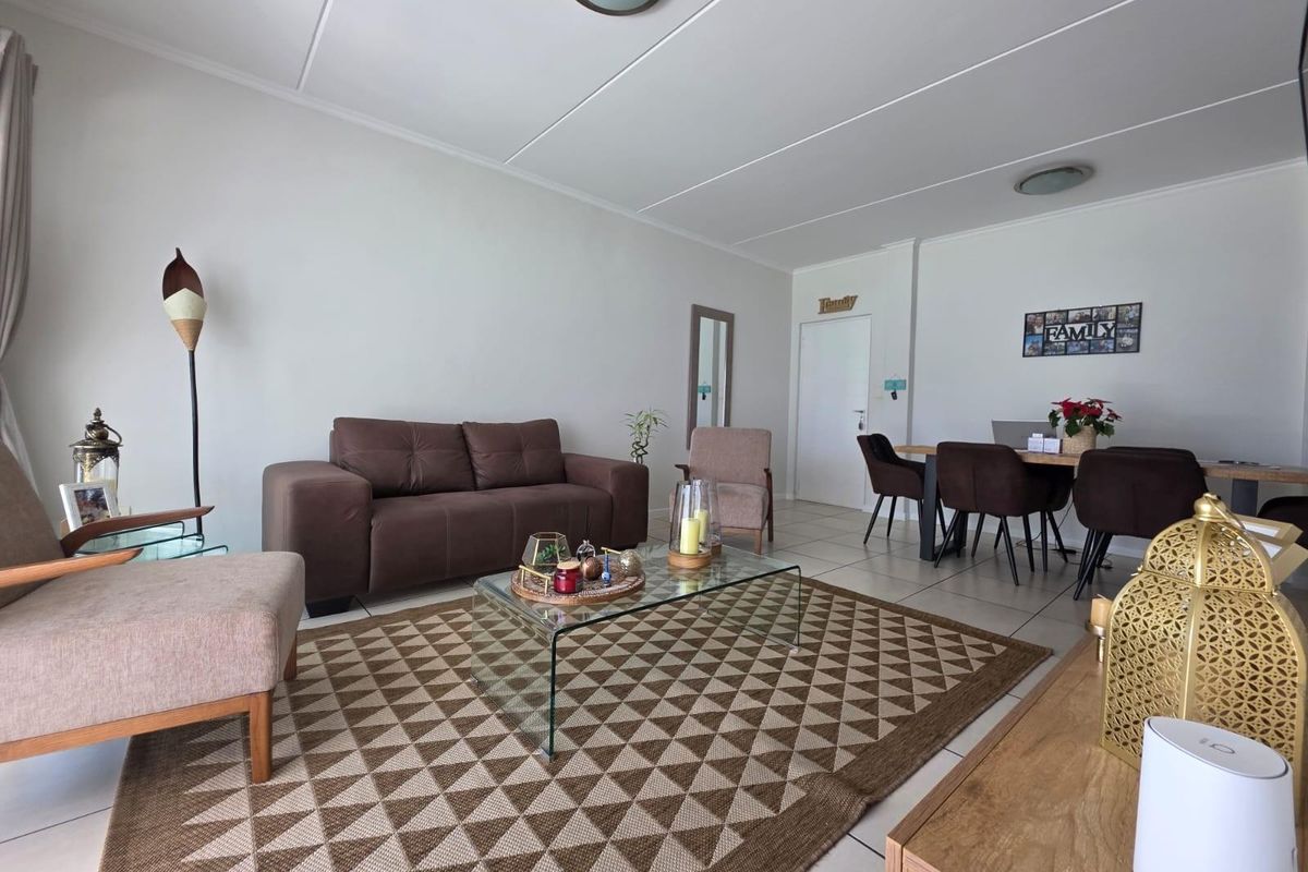 Modern Three-Bedroom Home in Secure Lifestyle Estate with Exceptional Amenities - Photo 2