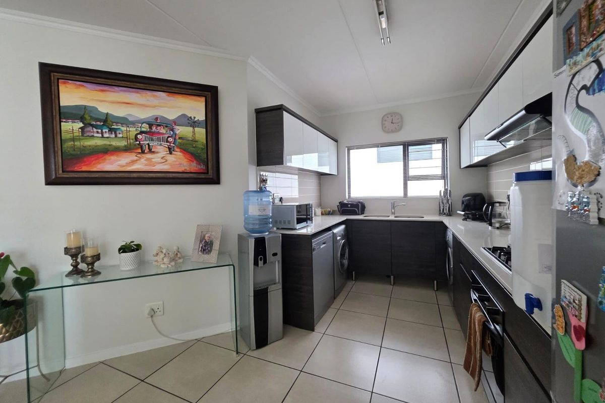 Modern Three-Bedroom Home in Secure Lifestyle Estate with Exceptional Amenities - Photo 5