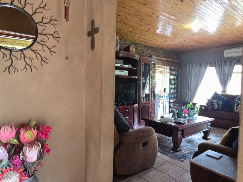 Elegant Neutral Living with Poolside Comfort and Home Office Space - Photo 9