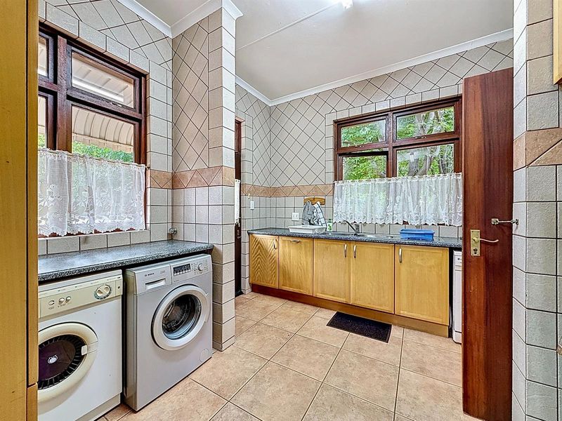 Upmarket Mooikloof Equestrian Family Home with Flat, Solar and Borehole - Photo 9