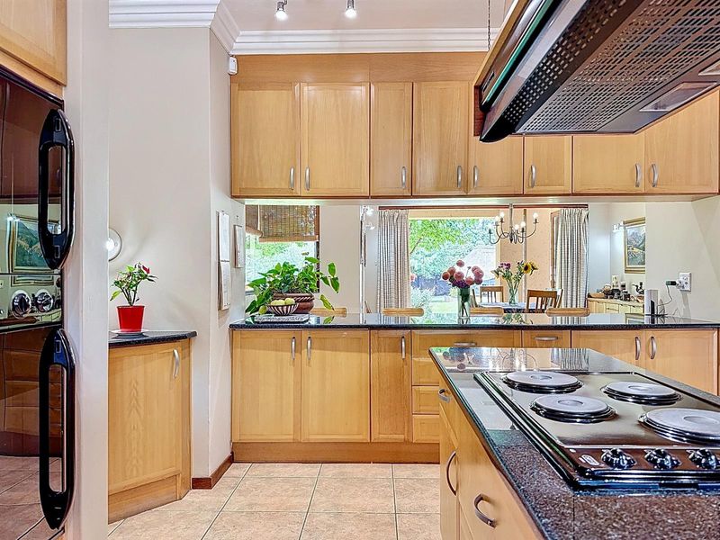 Upmarket Mooikloof Equestrian Family Home with Flat, Solar and Borehole - Photo 8