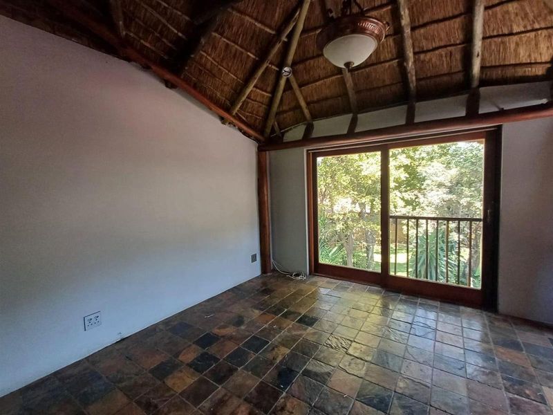 A Private Thatch Retreat in the Heart of Garsfontein - Photo 3