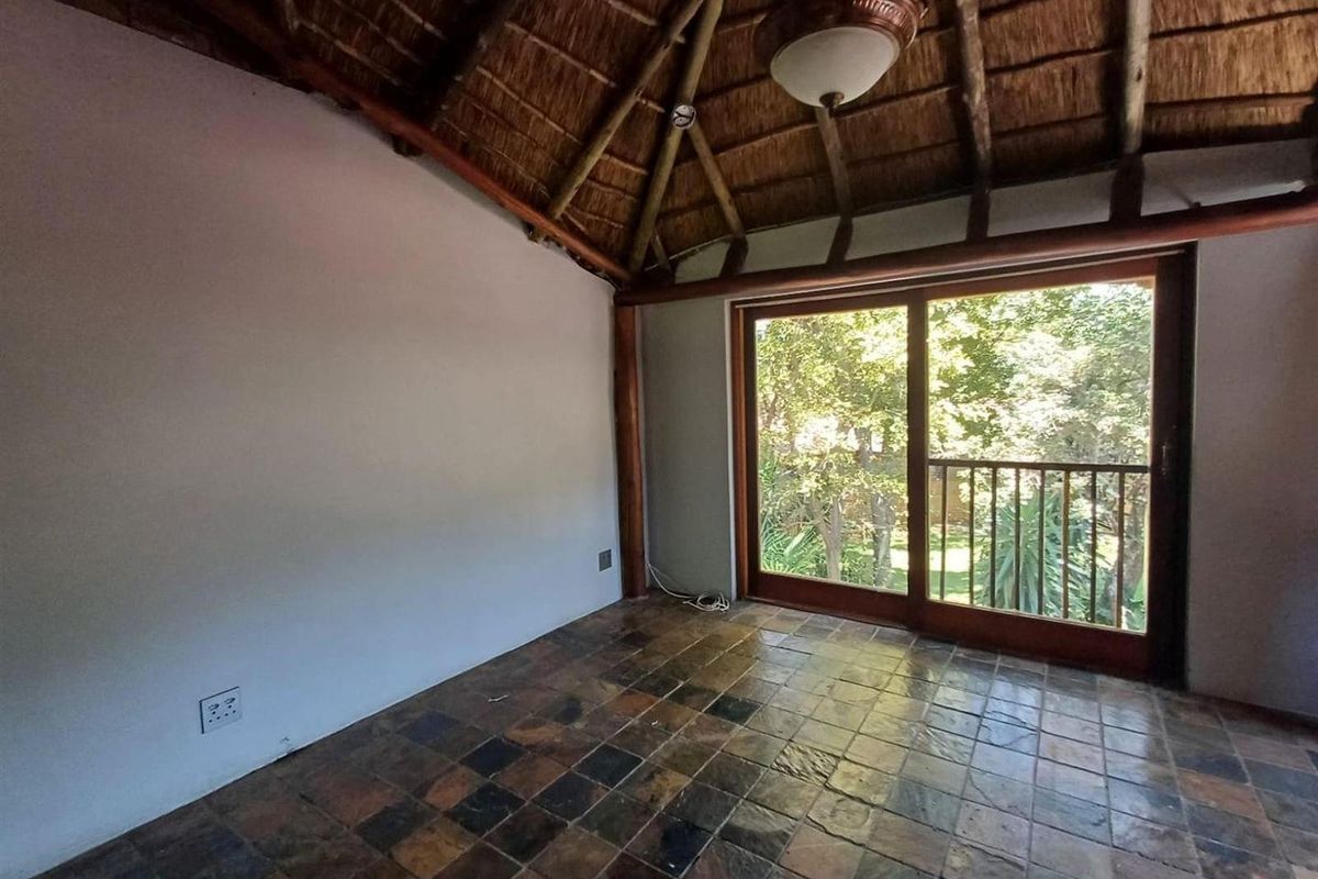 A Private Thatch Retreat in the Heart of Garsfontein - Photo 3