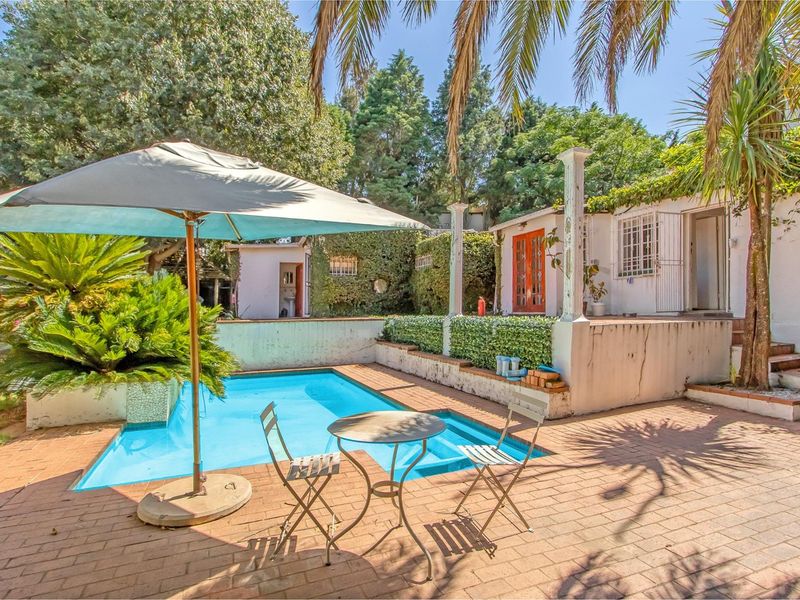 Multi-dwelling property with three dwellings, pool, games room and generator set within mature trees - Photo 3