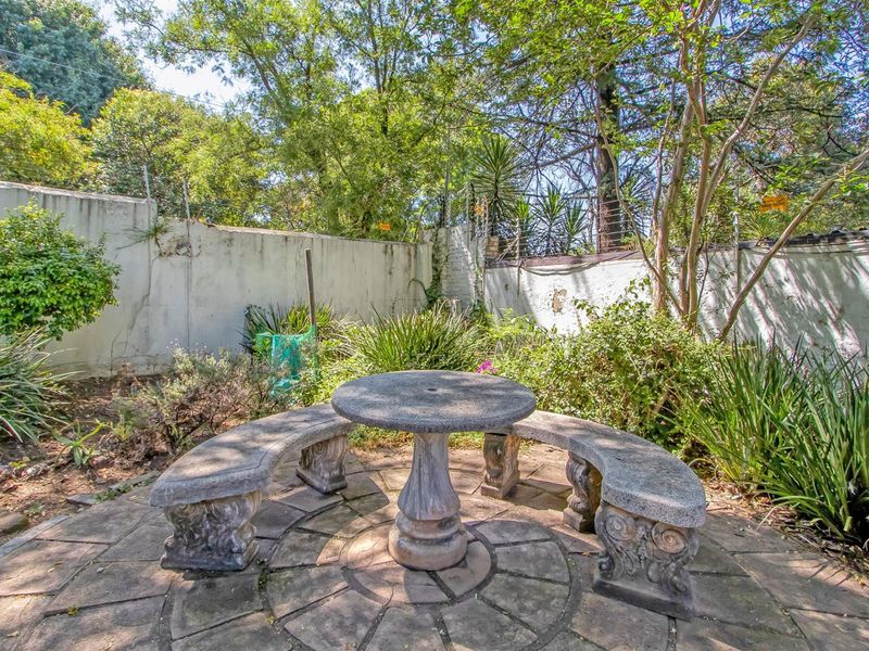 Multi-dwelling property with three dwellings, pool, games room and generator set within mature trees - Photo 7