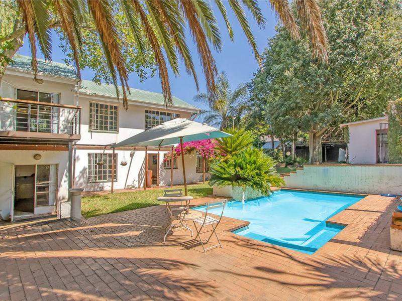 Multi-dwelling property with three dwellings, pool, games room and generator set within mature trees - Photo 2