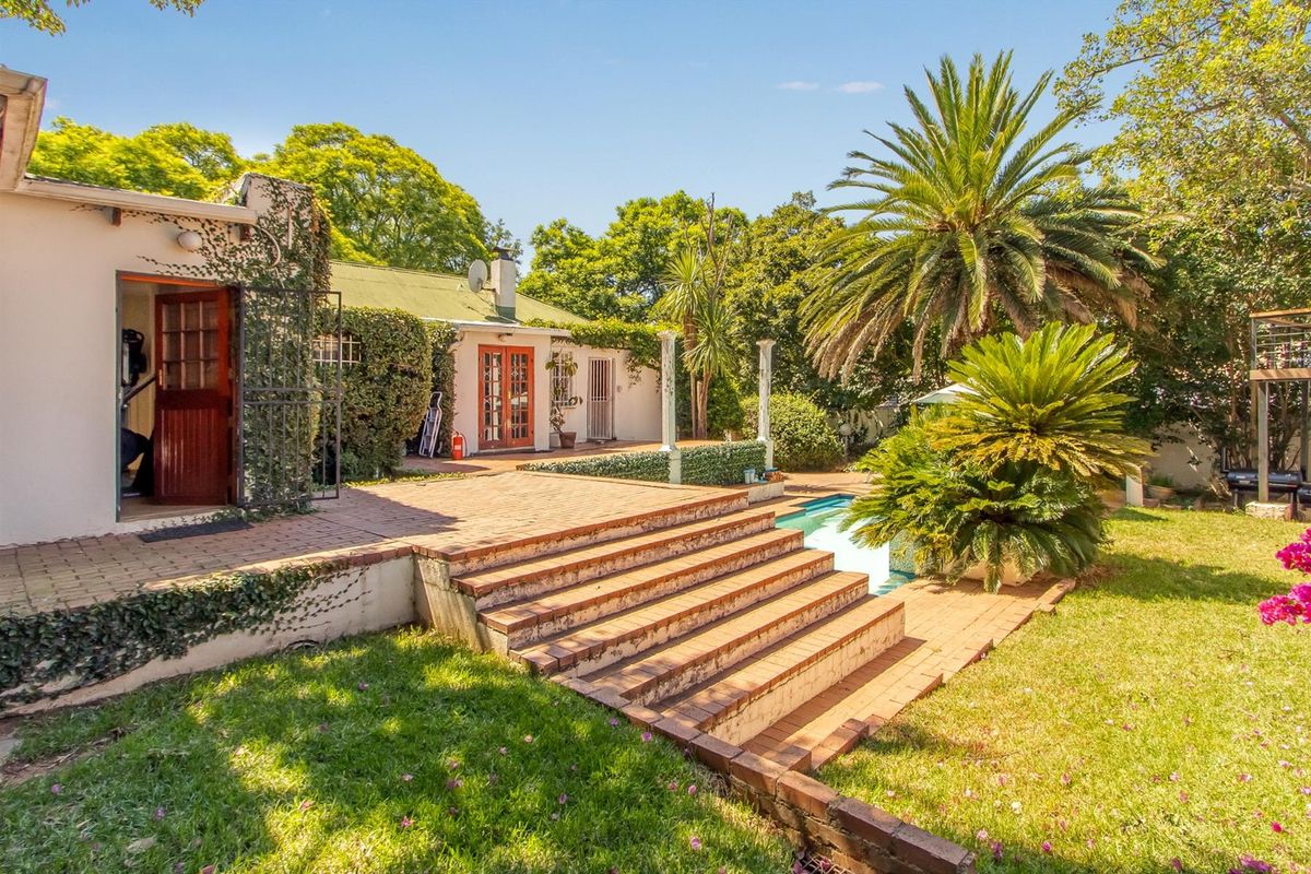 Multi-dwelling property with multiple dwellings, pool, games room, generator set within mature trees - Photo 4