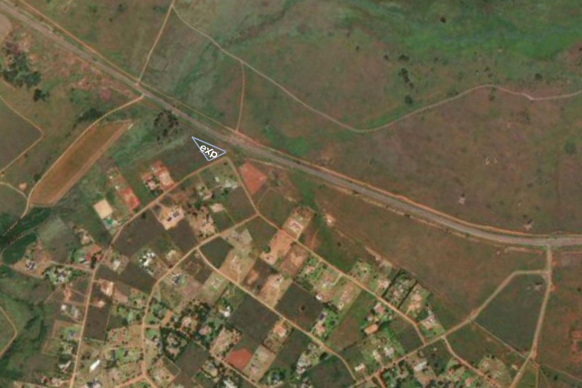 Aerial view of the residential land parcel showing its location and surrounding landscape.