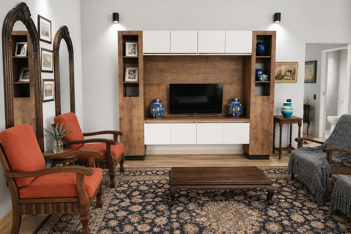 A well-maintained living room featuring a large, modern built-in media unit with integrated cabinetry and stylish wall-mounted accent lighting.
