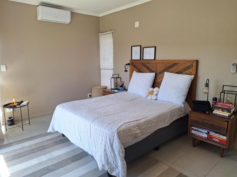 Modern 2-Bedroom Apartment with Stunning Dam Views in Palm Lakes Estate - Photo 6