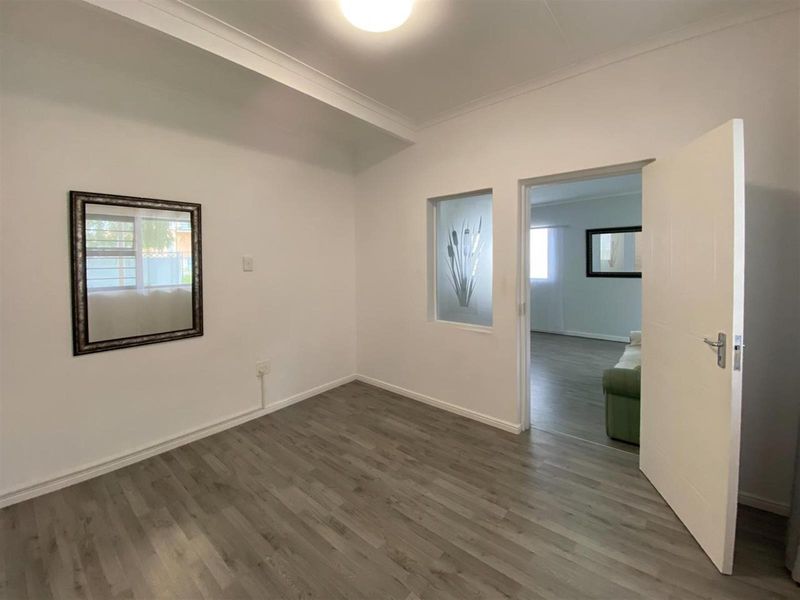 Versatile Renovated Home with Two Income-Generating Flatlets - Photo 7