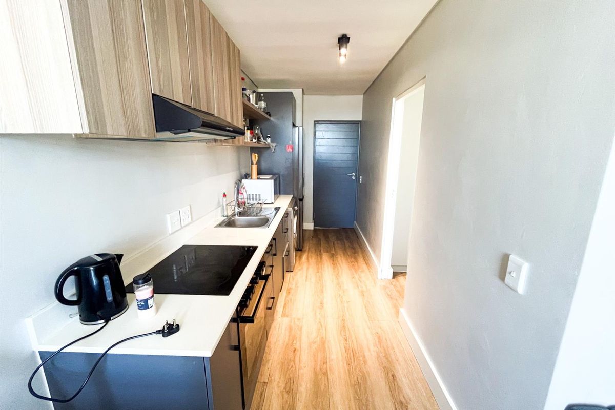 Modern One-Bedroom Apartment in Secure, Well-Managed Complex - Photo 2