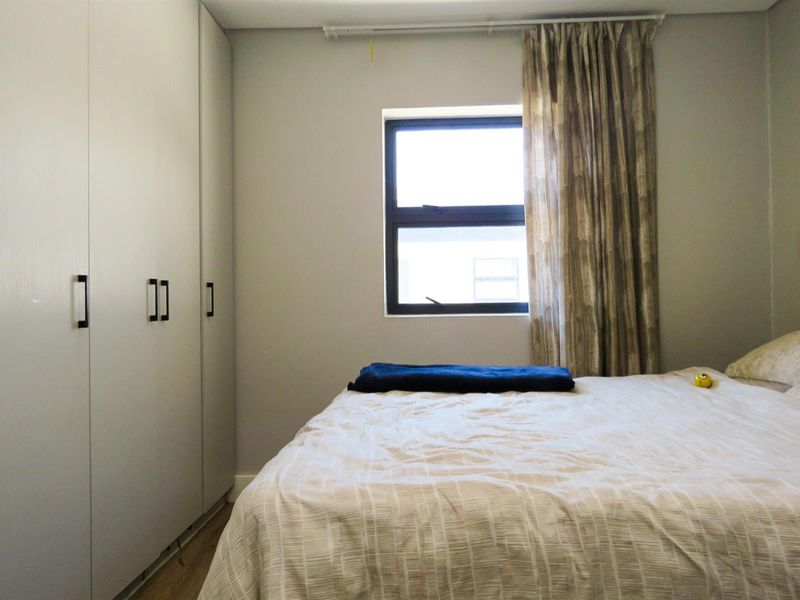 Modern One-Bedroom Apartment in Secure, Well-Managed Complex - Photo 9