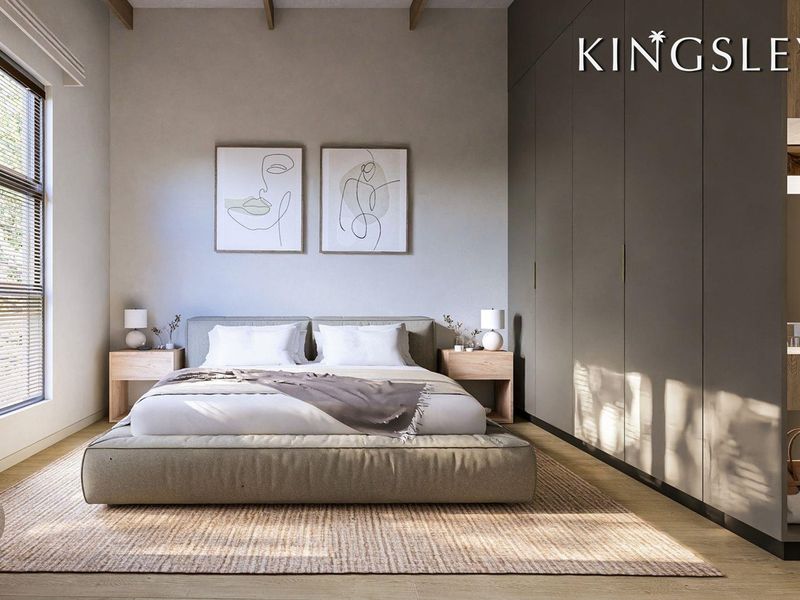Modern bedroom featuring high ceilings with exposed timber beams, sleek floor-to-ceiling built-in cupboards, and warm timber flooring.