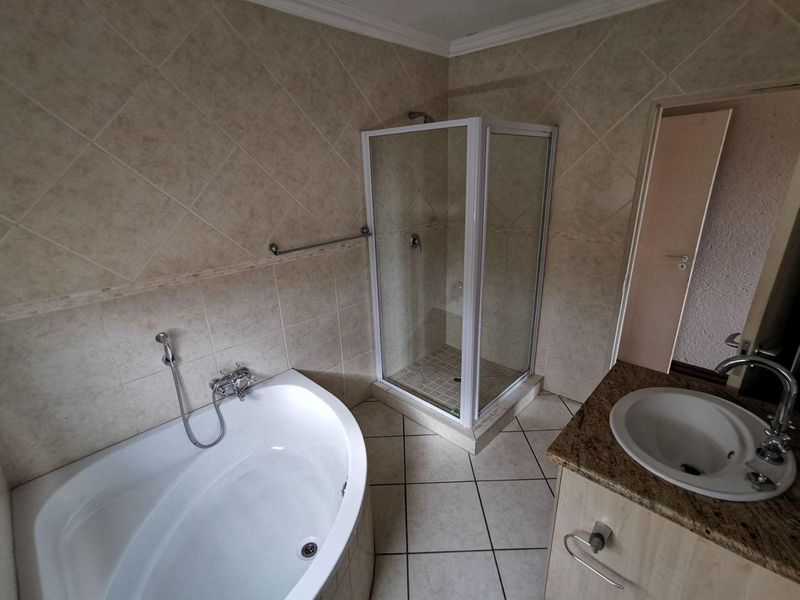 Contemporary Elegance Meets Tuscan Charm: Your Designer Townhouse Retreat in Hillcrest - Photo 9