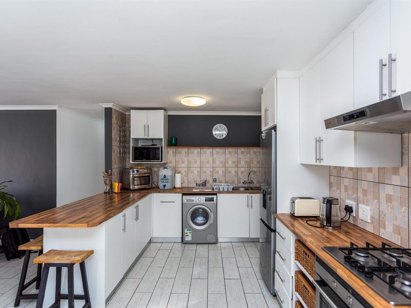 Charming Low-Maintenance Home in Secure Gated Complex - Photo 2