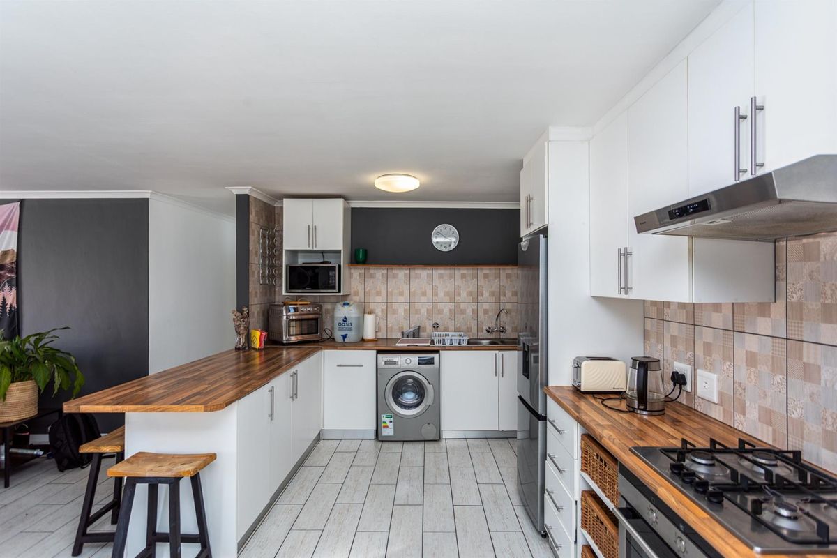 Charming Low-Maintenance Home in Secure Gated Complex - Photo 2