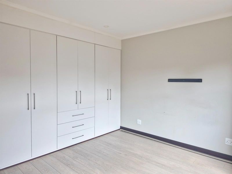 Sophisticated Lock-Up-and-Go Unit with Double Garage and Private Garden - Photo 9