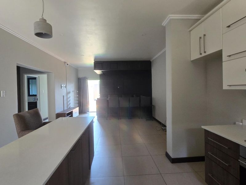 Sophisticated Lock-Up-and-Go Unit with Double Garage and Private Garden - Photo 4