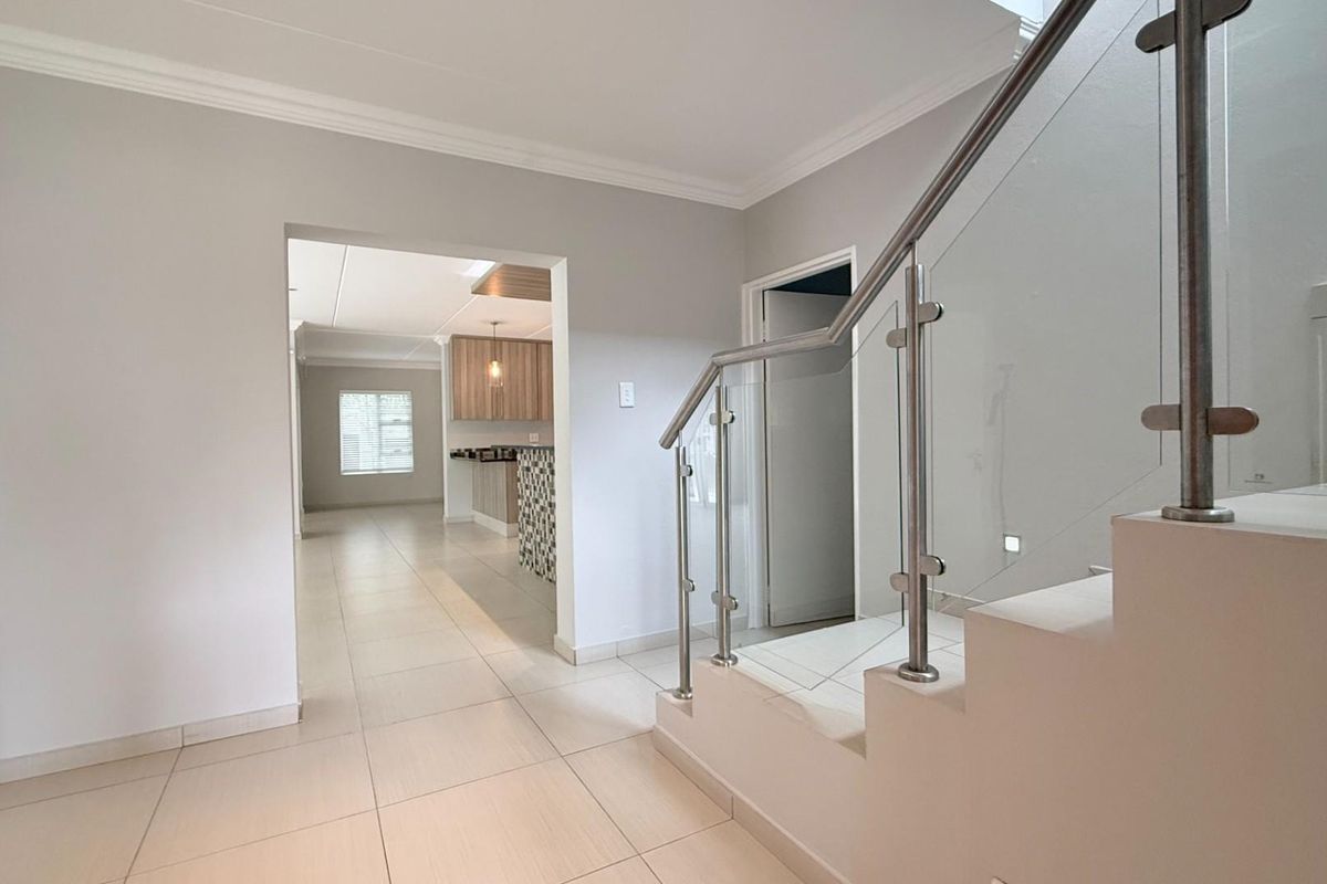 ULTRA MODERN FAMILY HOUSE IN SECURE ESTATE IN RIETVALLEIRAND - Photo 5