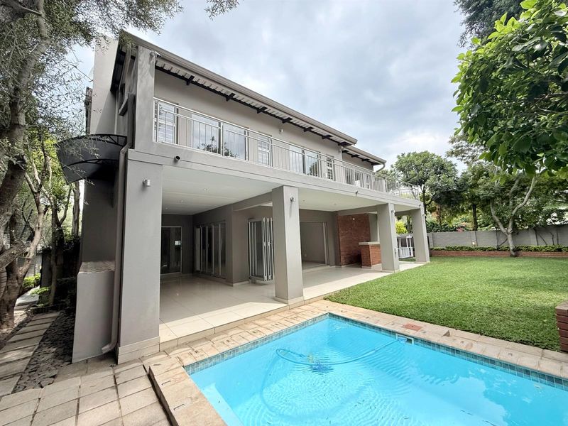 ULTRA MODERN FAMILY HOUSE IN SECURE ESTATE IN RIETVALLEIRAND - Photo 1