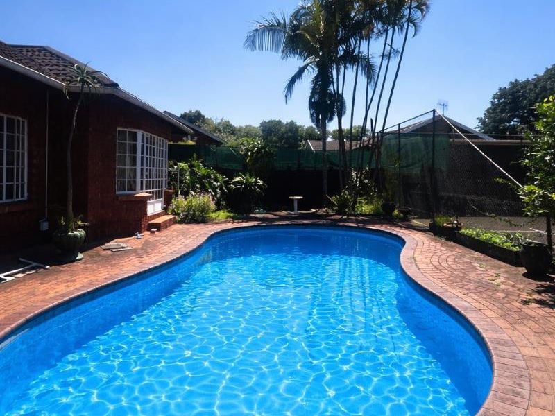 Exceptional lifestyle home with tennis court, entertainment wing, pool, and flatlet - Photo 1