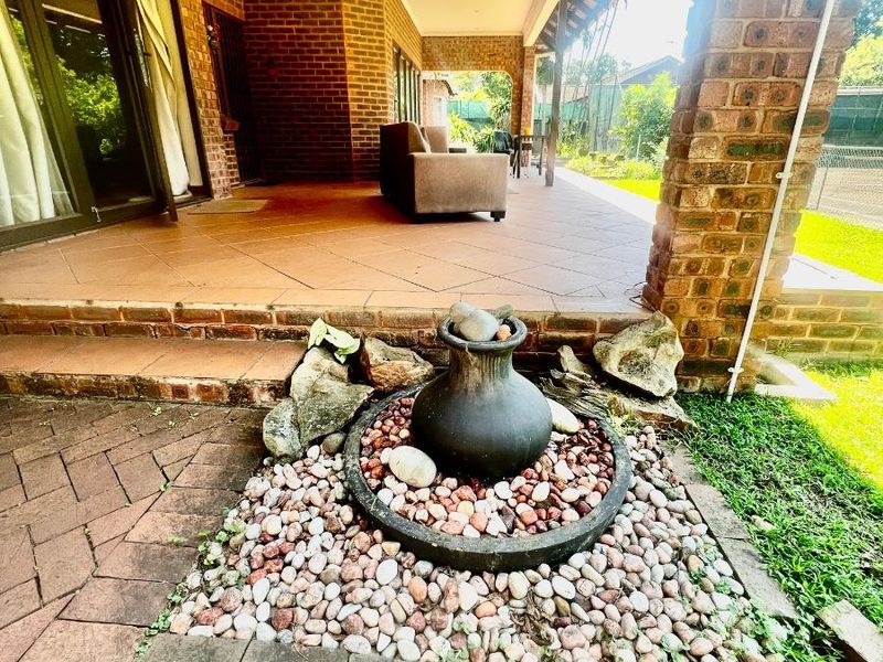 Exceptional lifestyle home with tennis court, entertainment wing, pool, and flatlet - Photo 4