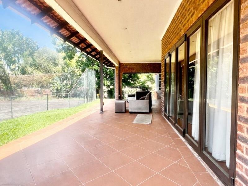 Exceptional lifestyle home with tennis court, entertainment wing, pool, and flatlet - Photo 5