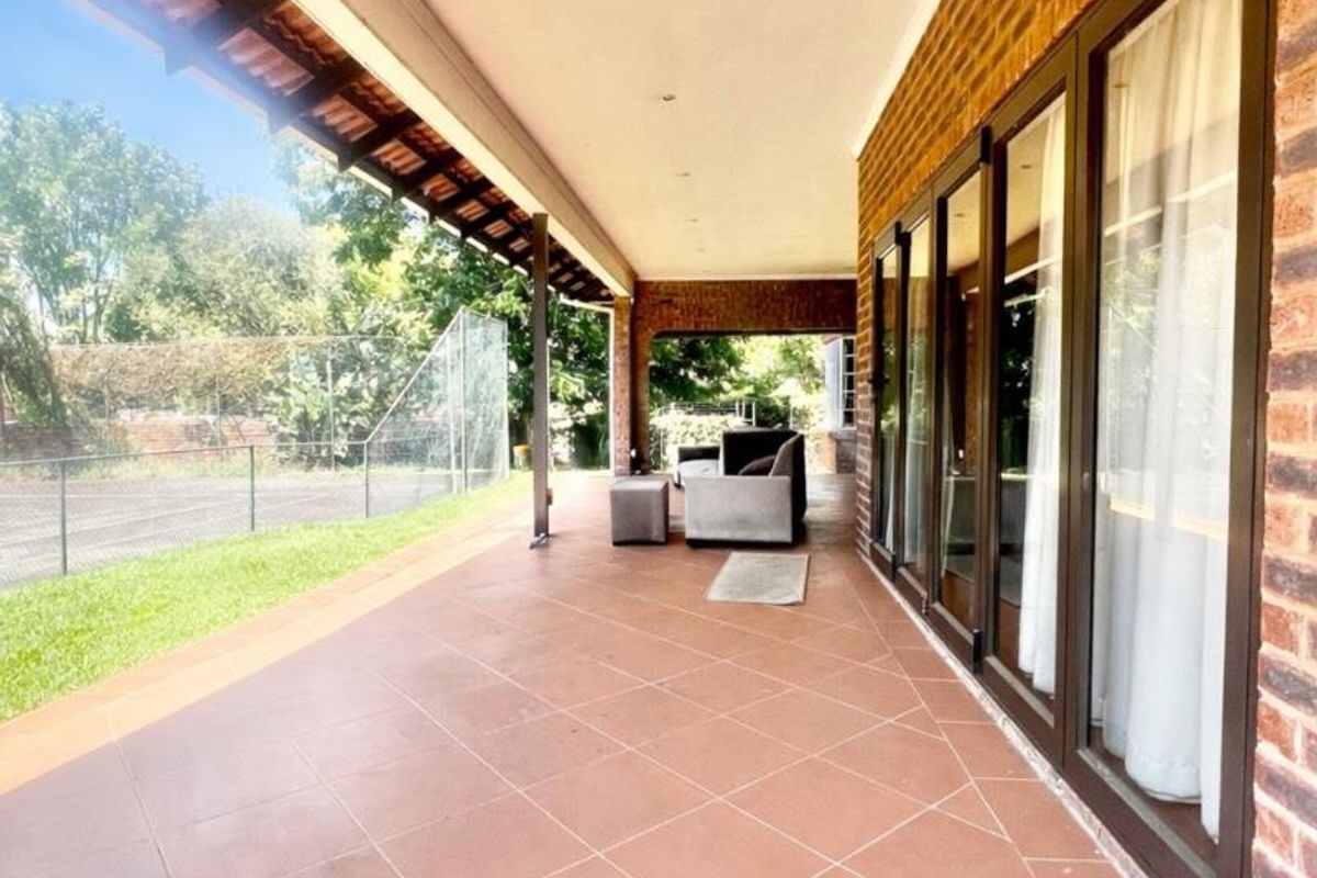 Exceptional lifestyle home with tennis court, entertainment wing, pool, and flatlet - Photo 5